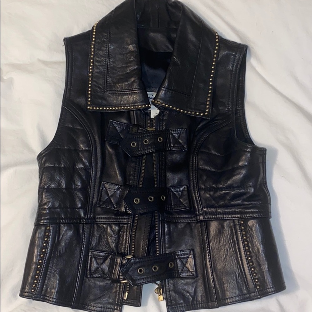 Black leather vest with gold trim